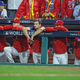 The Philadelphia Phillies dugout watches on during the 9th inning of World Series Game 4